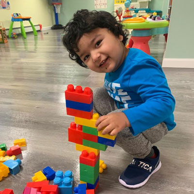 Child playing with legos